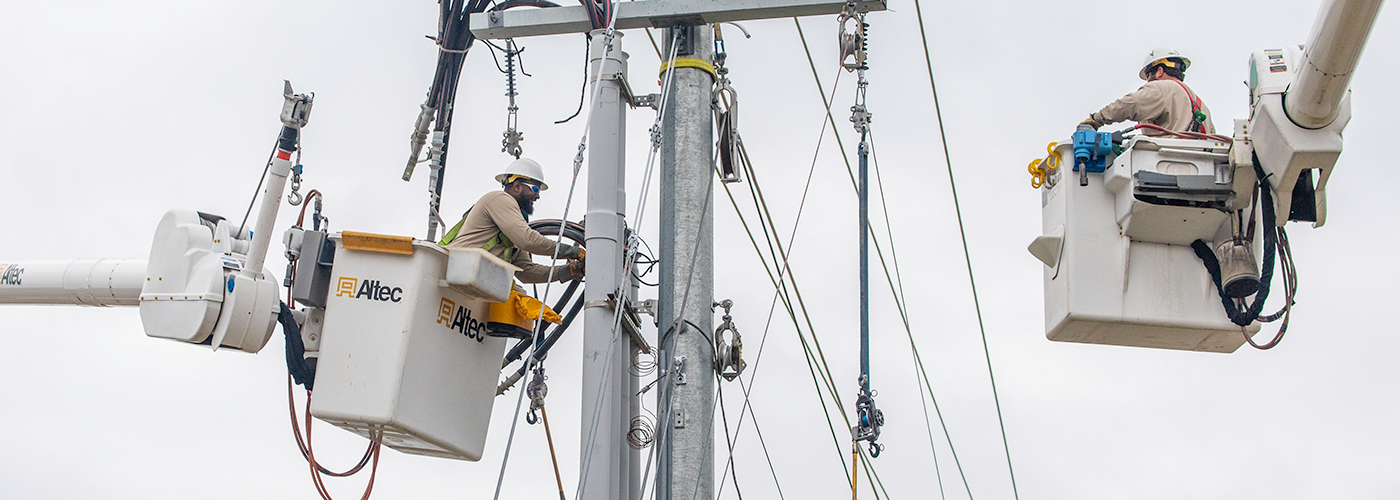 Linemen working at a substation